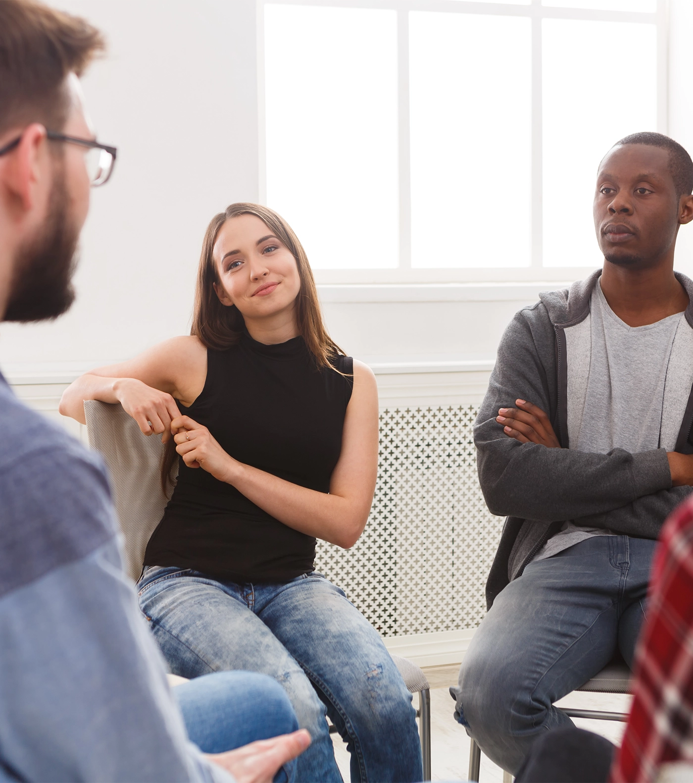 Meeting of support group. Young woman therapist listening to other people. Mental health, psychotherapy concept