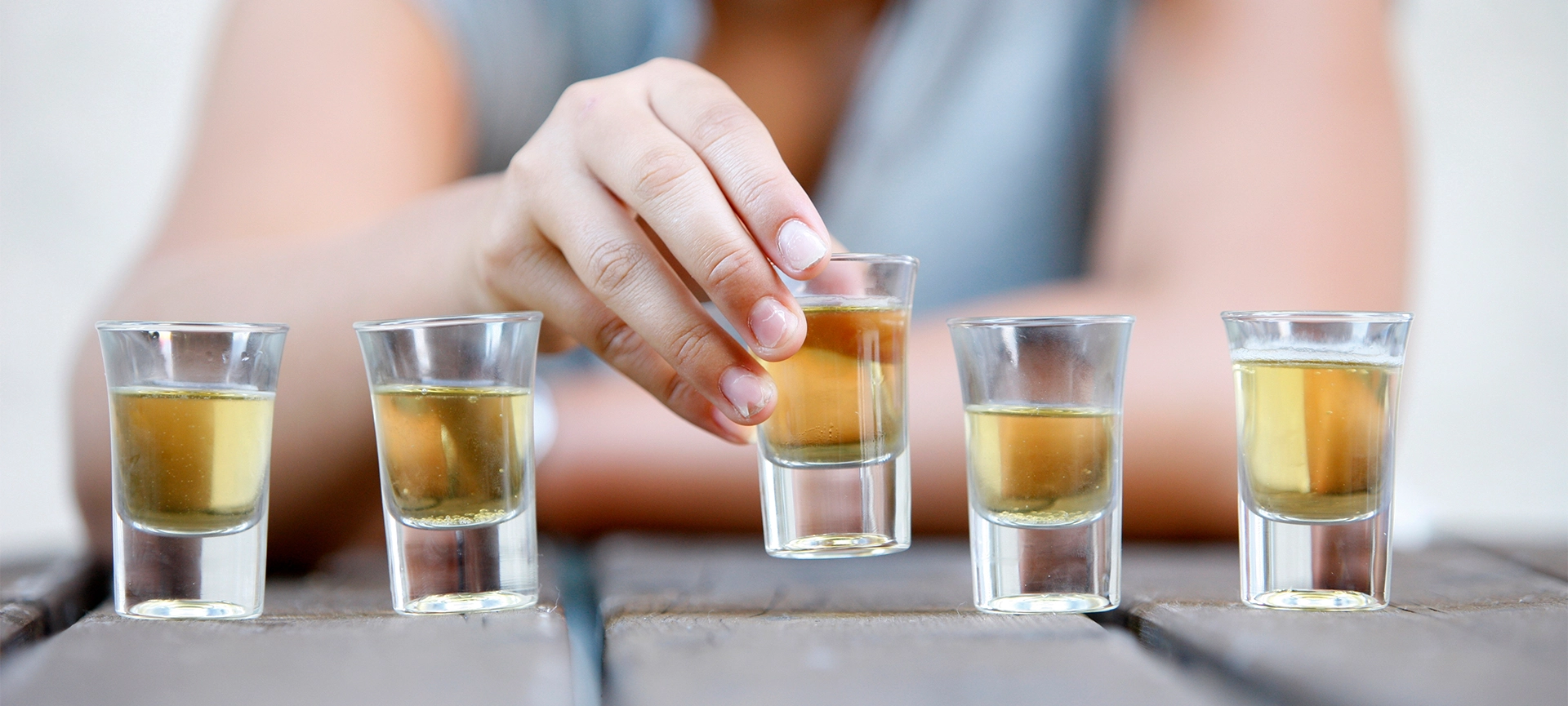 Young and alcohol. Alcohol addiction and binge drinking concept.