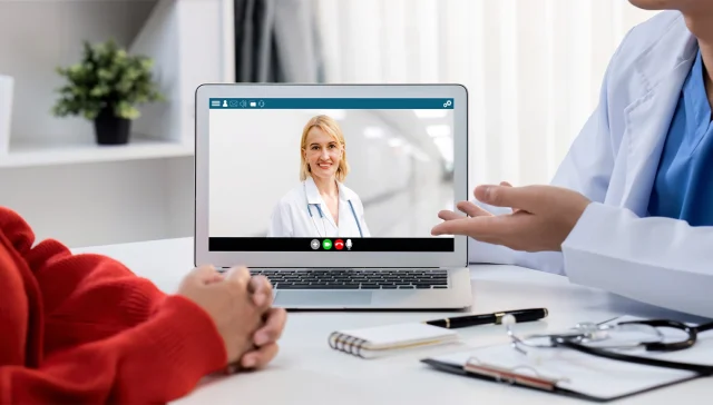 Doctor video call online by brisk telemedicine software application for virtual meeting with patient