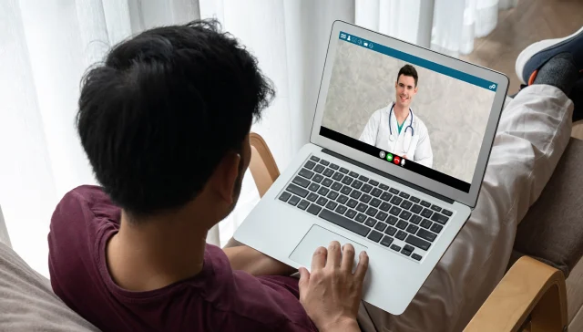 Doctor video call online by modish telemedicine software application for virtual meeting with patient